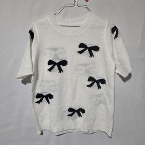 White and Black Bow Print Knit Top